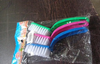 Set of cleaning brushes for multi-purpose use in the kitchen.